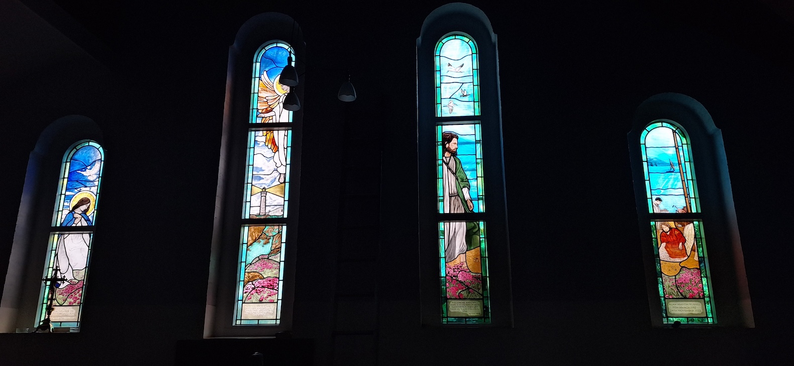 St Philomenas - 2 memorial windows